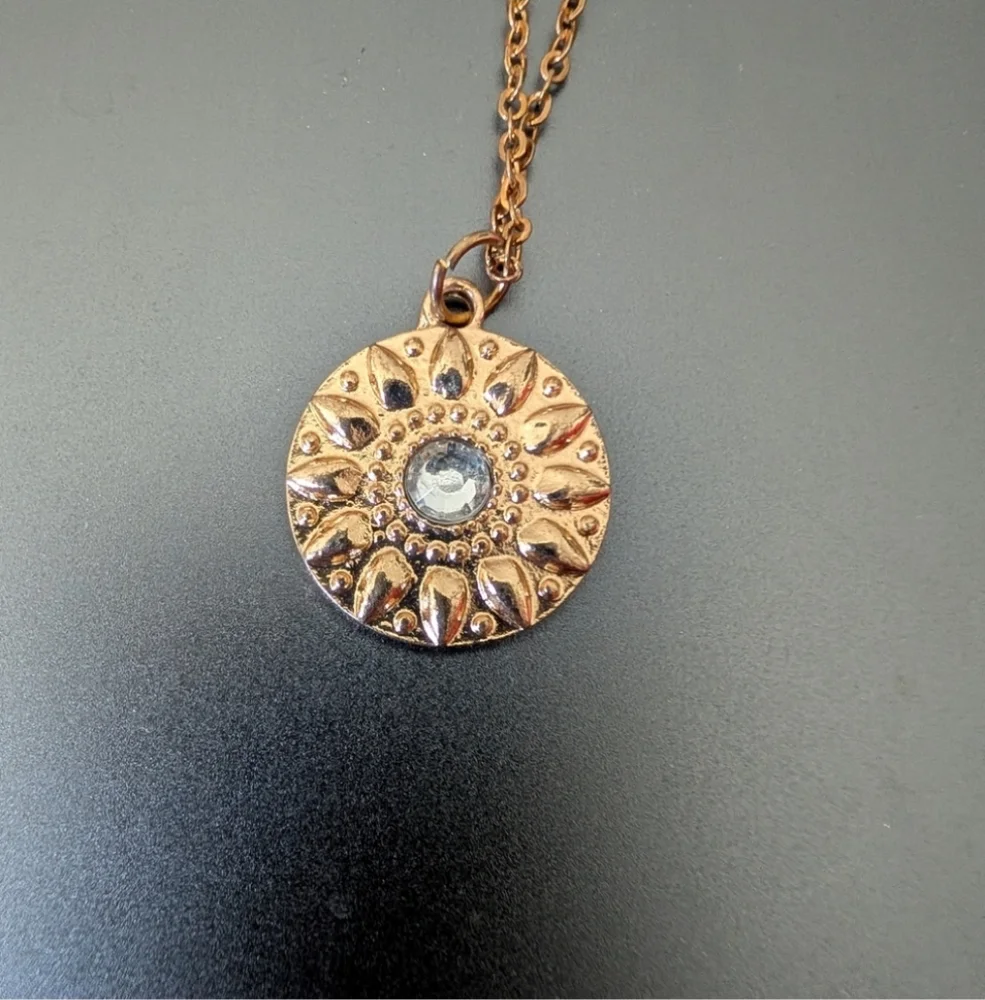 Elegant Triple-Strand Necklace in Coppery Metal with Crystal Teardrops
